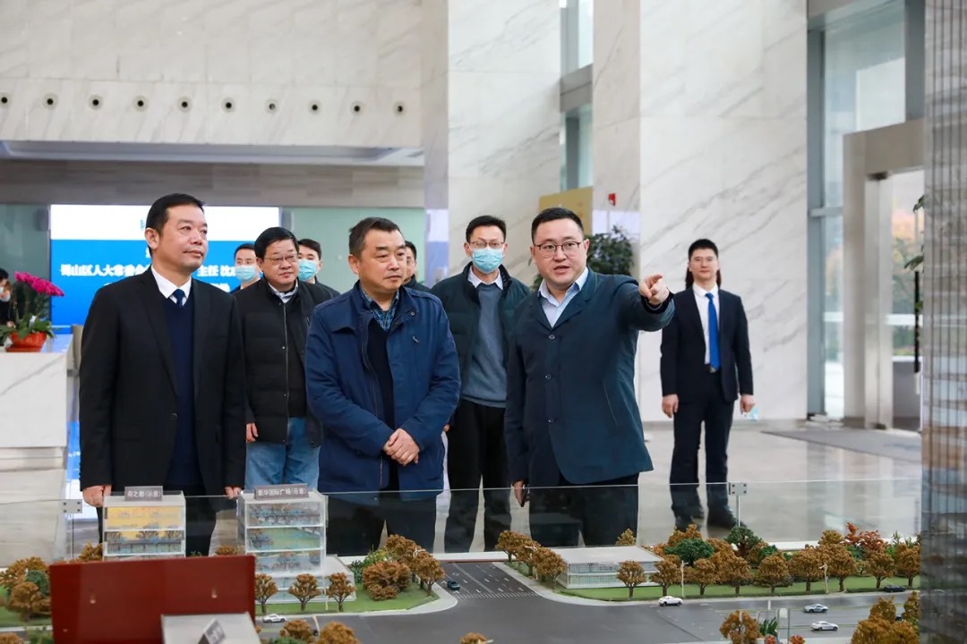 合肥市蜀山區人大常委會主任沈成富一行深入新華控股集團和華地集團調研指導！